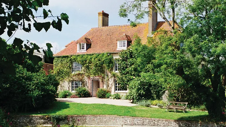 Charleston House — modest tile-hung farmhouse in the South Downs, with painted timber and a walled garden, Bloomsbury Group country home