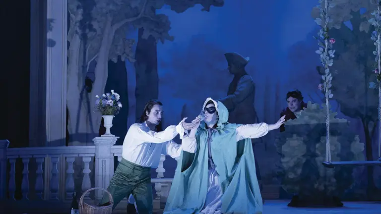 Singers in period costume performing a scene from Mozart's The Marriage of Figaro at Glyndebourne