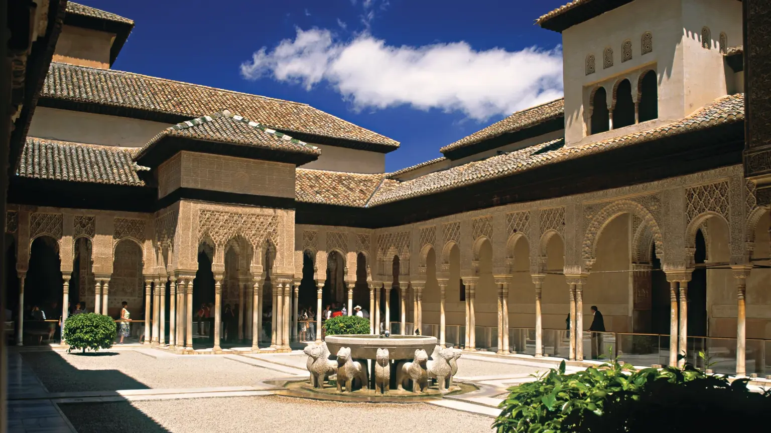 The arcaded Court of the Lions at the Alhambra in Granada, with its central marble lion fountain