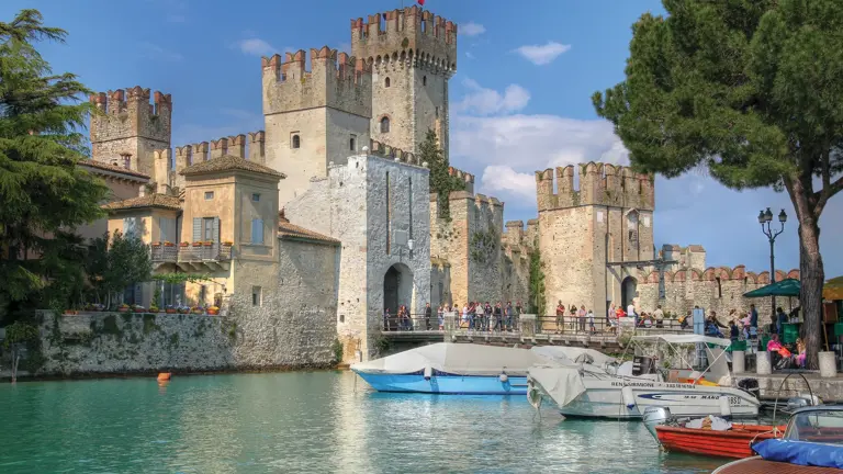 Sirmione on Lake Garda, the medieval Scaligero castle and old town on a narrow peninsula reaching into the lake's turquoise water