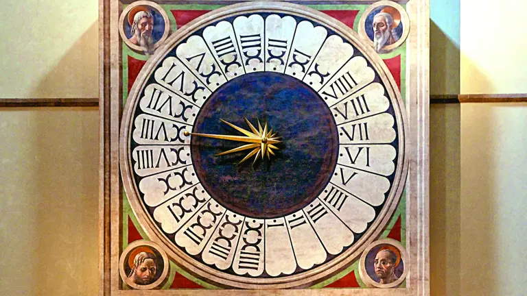The interior liturgical clock of Florence Cathedral, a large round face with painted prophet heads at its corners